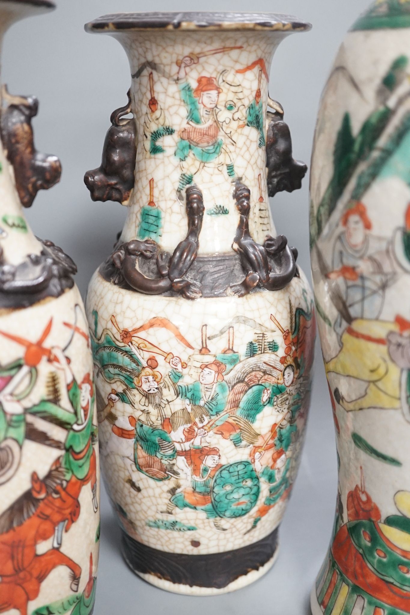 A pair of Chinese crackle glaze vases, a similar vase and cover, and another, late 19th/early 20th century (4), tallest 29 cms high.